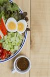 Closeup Mixed Vegetables Salad With Crab Stick And Japanese Dressing Stock Photo