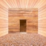 Stone Wall With Door And Stone Floor In Wooden Room Stock Photo