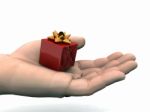 Hand Holding Gift Stock Photo