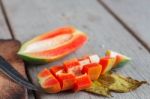 Cut Of Papaya On Wooden Stock Photo