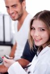 Female Doctor Checking Blood Pressure Stock Photo