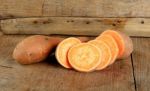 Sweet Potato On The Wooden Background Stock Photo