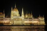 Hungarian Parliament Building Illuminated At Night In Budapest Stock Photo