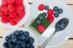 Green Tea Matcha Mousse Cake With Berries Stock Photo