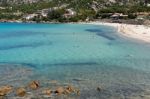 The Beach At Baja Sardinia Stock Photo