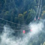 Zwölferhorn Mountain Cable Car Running Down To St Gilgen Stock Photo