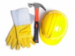 Hard Hat Hammer And Leather Gloves Stock Photo