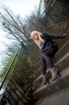 Blonde Caucasian Girl Posing Outdoors Stock Photo