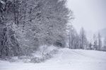 Snowfall And Sleet On Winter Road. Ice Snowy Road. Winter Snowst Stock Photo