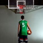 Basketball Player Stand In The Game Stock Photo