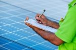 Engineer Checking Solar Station  Stock Photo