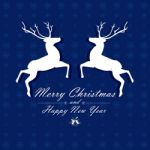 Merry Christmas And Happy New Year With White Reindeer On Blue Background Stock Photo