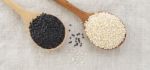 Black And White Sesame On Wood Spoon Stock Photo