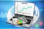 Laptop Showing A Spreadsheet And A Paper With Statistic Charts Stock Photo