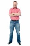 Casual Aged Man Standing On White Background Stock Photo