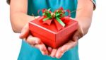 Woman Smile And Hold Gift Box In Hands Stock Photo