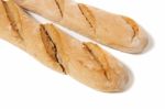 Traditional Baguette On White Background Stock Photo