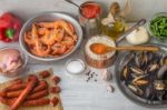 Ingredients For Paella On The White Scratched Table Stock Photo