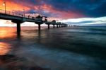 Pier In Sunset Stock Photo