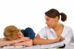 Teenage Boy Sleeping In Classroom Stock Photo