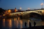 Seville , Spain - Mayo 28 2019: Isabel Ii Bridge Or Triana Bridge. Guadalquivir River. Seville, Andalusia, Spain Stock Photo