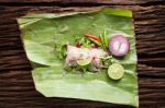 Nham Sour Pork In Banana Leaves Thai Food Stock Photo