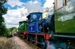 C Class And Bluebell Steam Engines Leaving Sheffield Park Statio Stock Photo