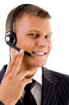 Young Customer Service Operating With Headset Stock Photo