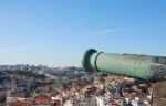 Cityscape Of Lisbon In Portugal With Cannon Weapon Stock Photo