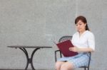 Portrait Of Thai Adult Businesswoman Beautiful Girl Read A Book Stock Photo