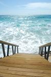 Wooden Stairs Or Path To The Bright Ocean Stock Photo