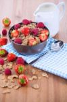 Bran Flakes With Fresh Raspberries And Strawberries And Pitcher Stock Photo