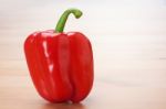 Red Sweet Pepper On Table Stock Photo