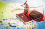 Red Sunglasses, Passport, Compass And Aircraft On Europe Map Stock Photo