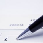 Writing A Cheque Stock Photo