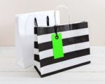 Shopping Bag With Green Tag Stock Photo