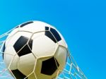 Soccer Ball In Net Stock Photo