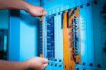 People Fix Core Switch In Network Room Stock Photo