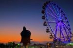 Sunset And Giant Wheel Stock Photo