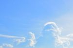 Blue Sky Background With White Clouds Stock Photo