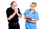 Aged Male Suffering From Cold, Sneezing Stock Photo