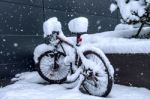 Bycicle Covered By Snow Stock Photo