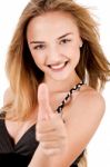 Happy Young Lady Showing Thumbs Up Stock Photo