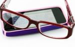 Reading An E-Mail With Glasses Stock Photo