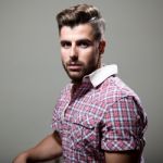 Elegant Young Handsome Man. Studio Fashion Portrait Stock Photo