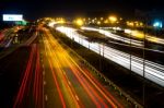 Darknight Traffic Light Trails On Street Stock Photo