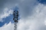 Cellphone Tower With Clouds In The Background Stock Photo