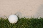 Golf Ball And Sand Bunker Stock Photo