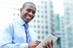 Businessman Posing With Digital Tablet Stock Photo