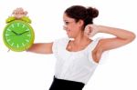 Business Woman Holding Clock Stock Photo